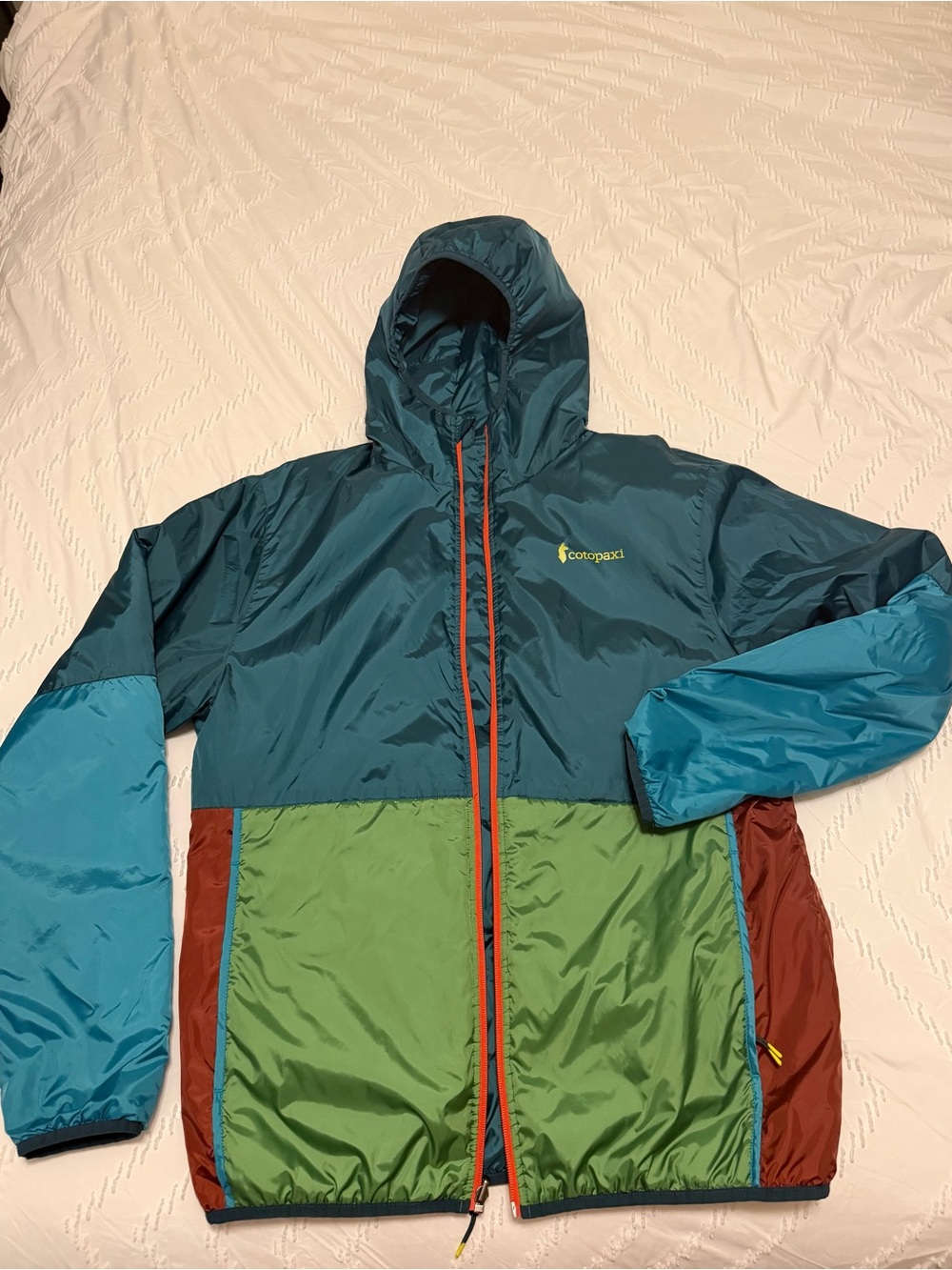 cotopaxi Teal, Light Blue, Green & Rust Colorblock Hooded Windbreaker